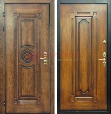 Коричневая металлическая дверь с массивом дуба с рисунком ДМД-10 в Дедовске