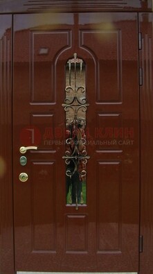 Красивая металлическая дверь со стеклом и ковкой ДСК-33 в Дедовске