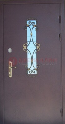 Металлическая дверь со стеклом и ковкой ДСК-77 в Дедовске